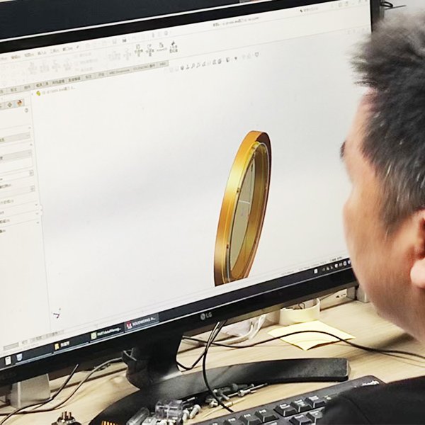 engineer adjusting heating equipment parameters during research and development